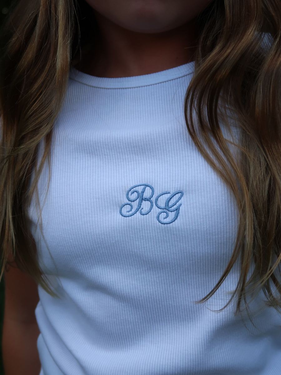 White ribbed tank with blue embroidered initials BG
